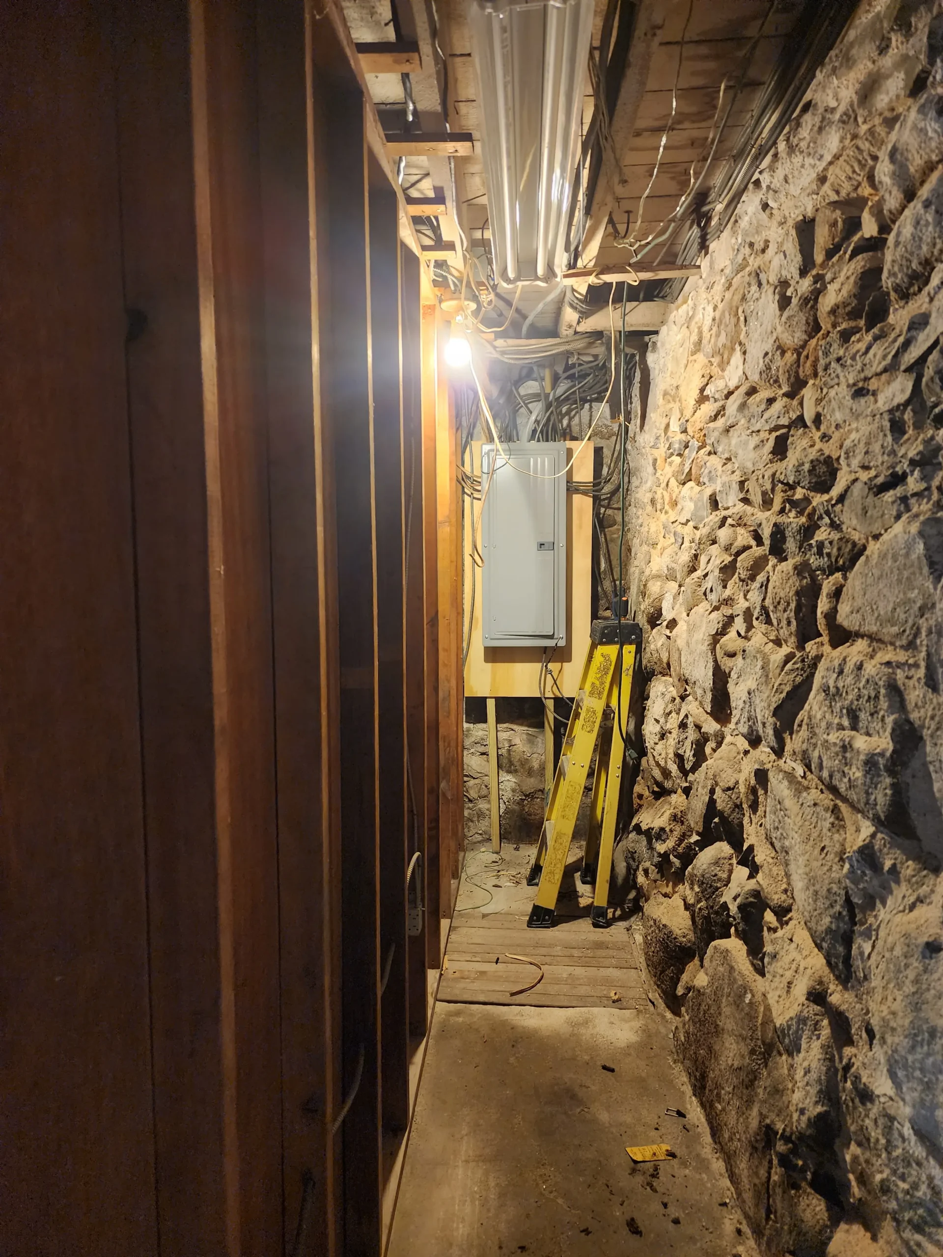 Electrical panel replacement in the basement of an older Massachusetts home