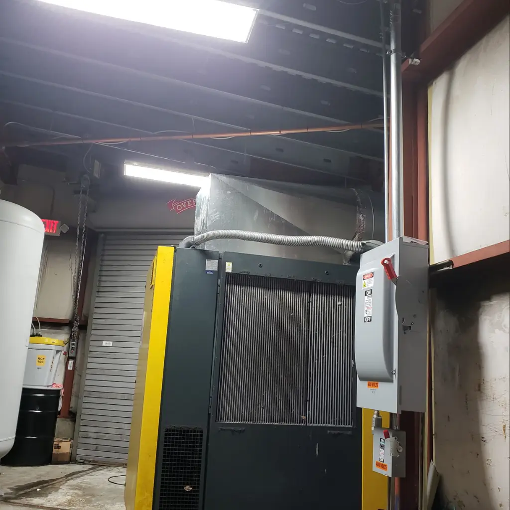 480-volt disconnect switch installed for a shop air compressor system