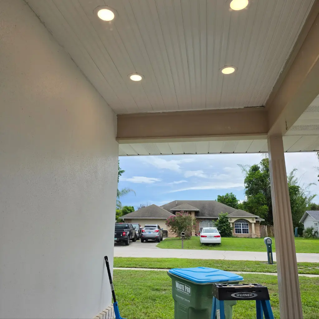 Recessed LED lights installed in a covered outdoor entry