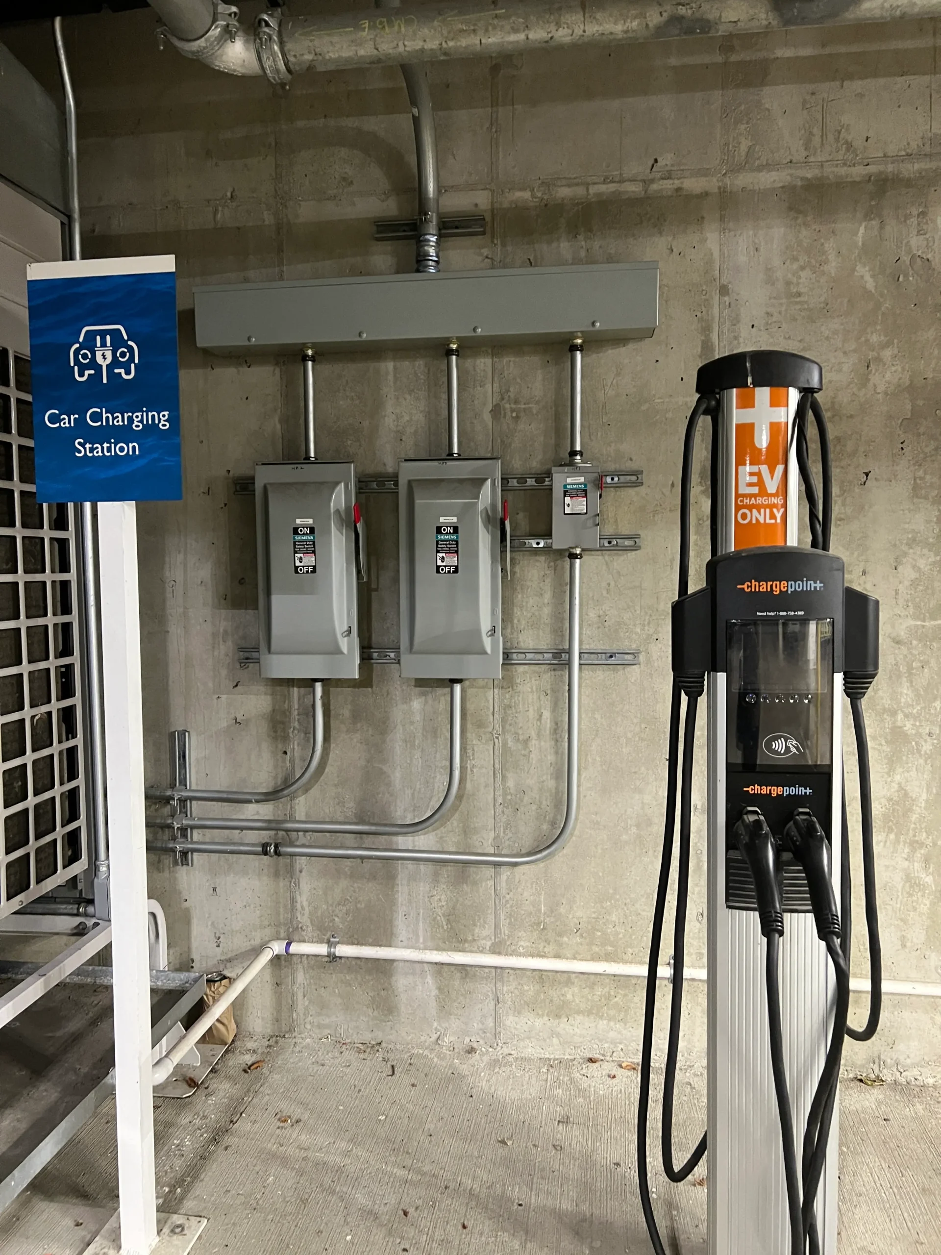 ChargePoint EV charging station with dedicated electrical disconnects and conduit